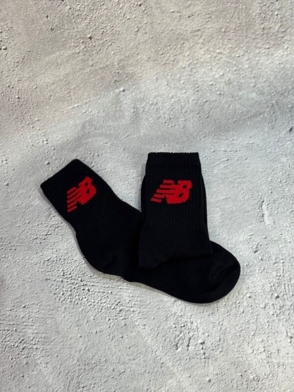 New balance negra 3/4