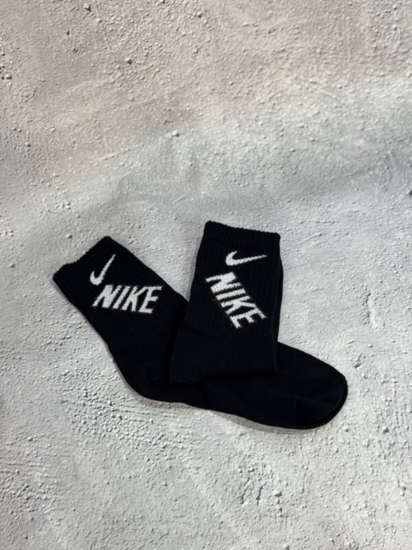 Nike doble negra 3/4